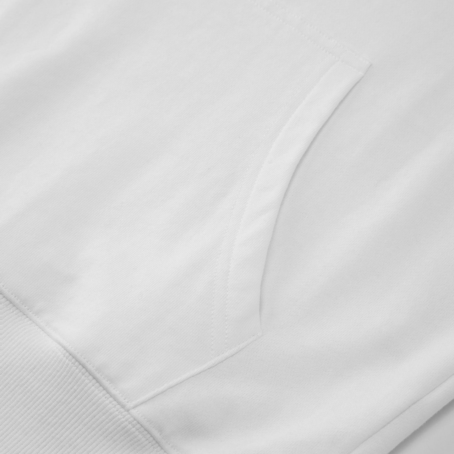 Close-up of a white hoodie with a focus on the neckline and shoulder area.