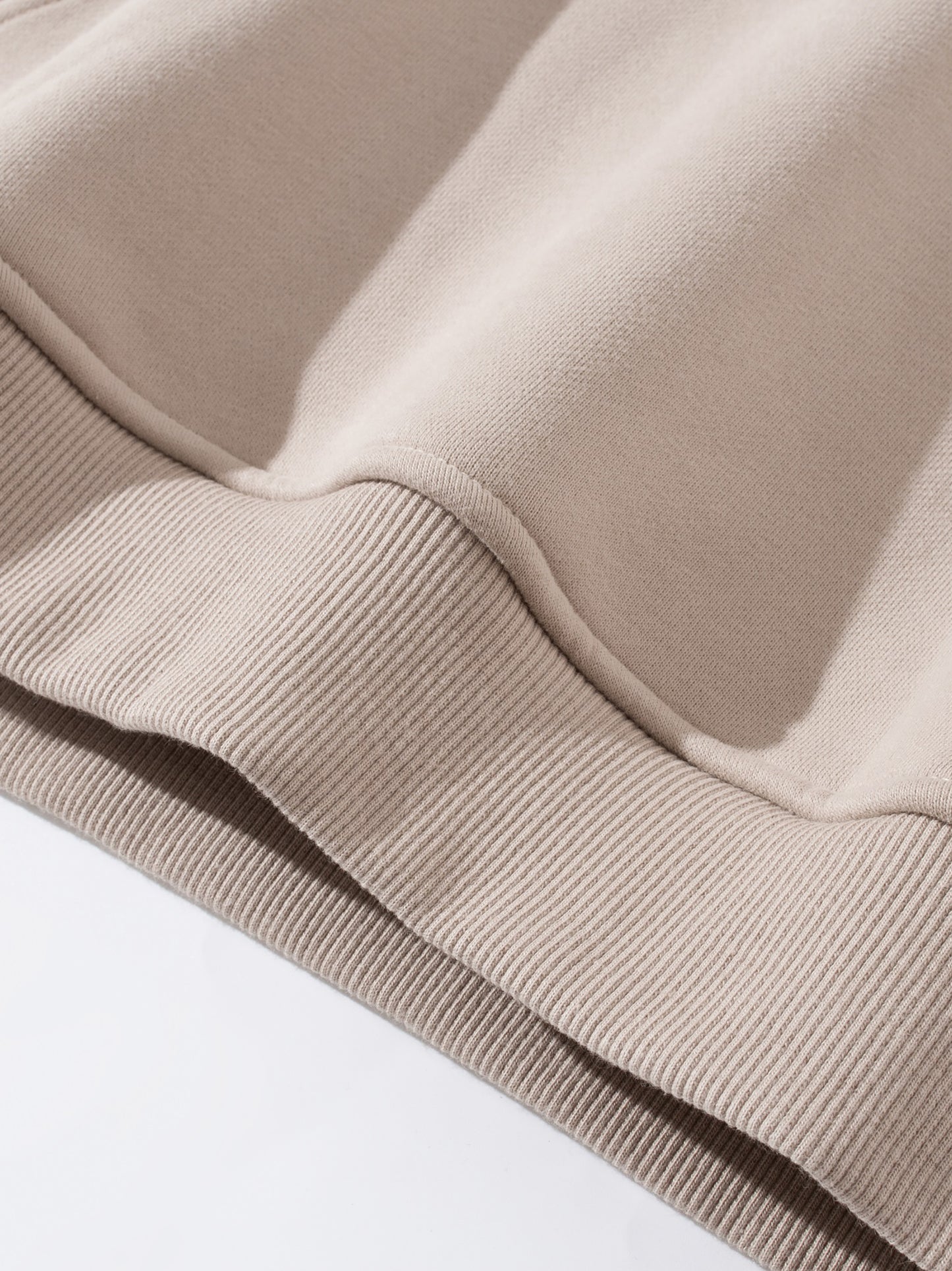 Close-up of heavyweight fabric and stitching on VÉRON premium hoodie 2.