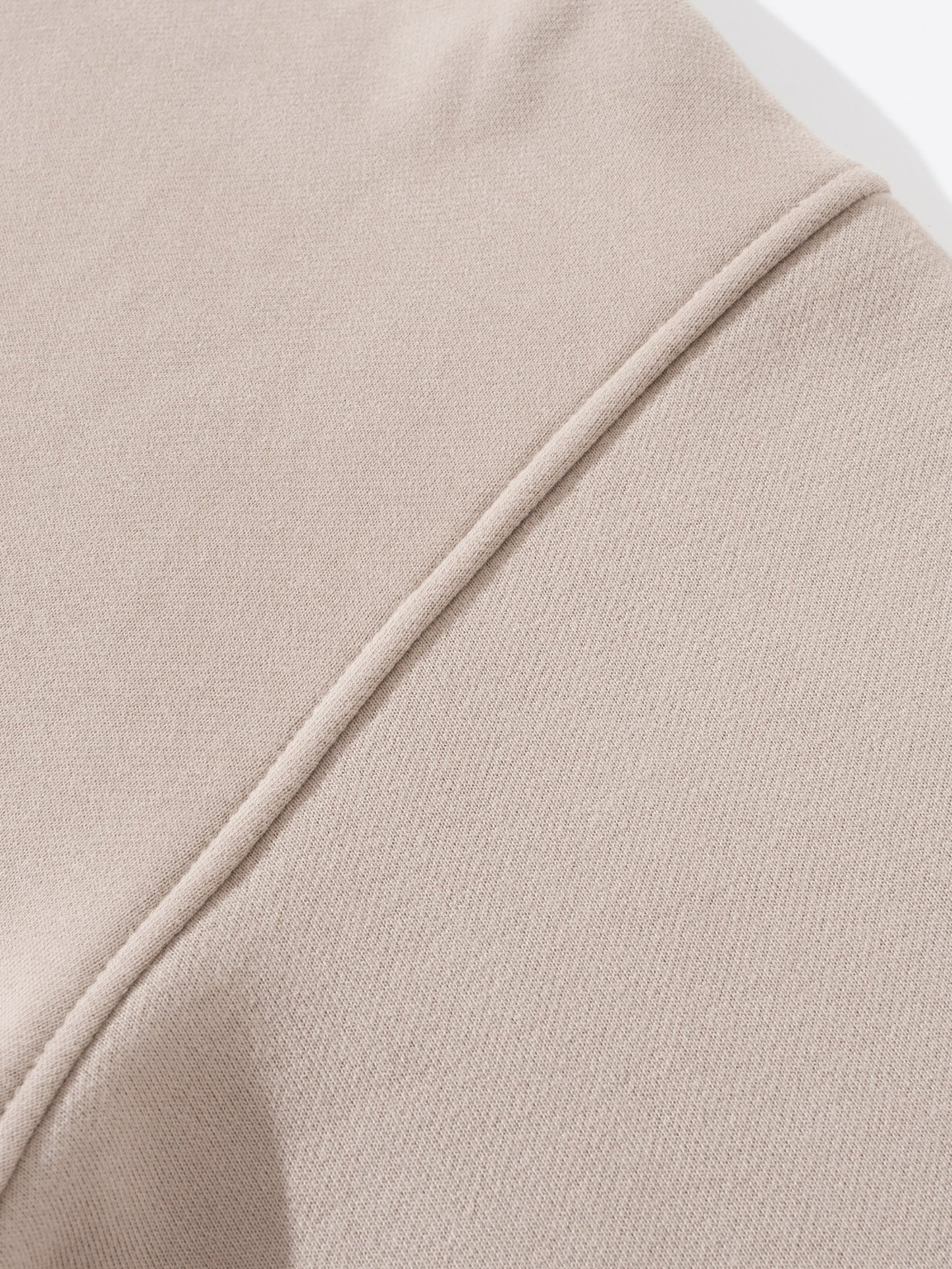 Close-up of heavyweight fabric and stitching on VÉRON premium hoodie 6.