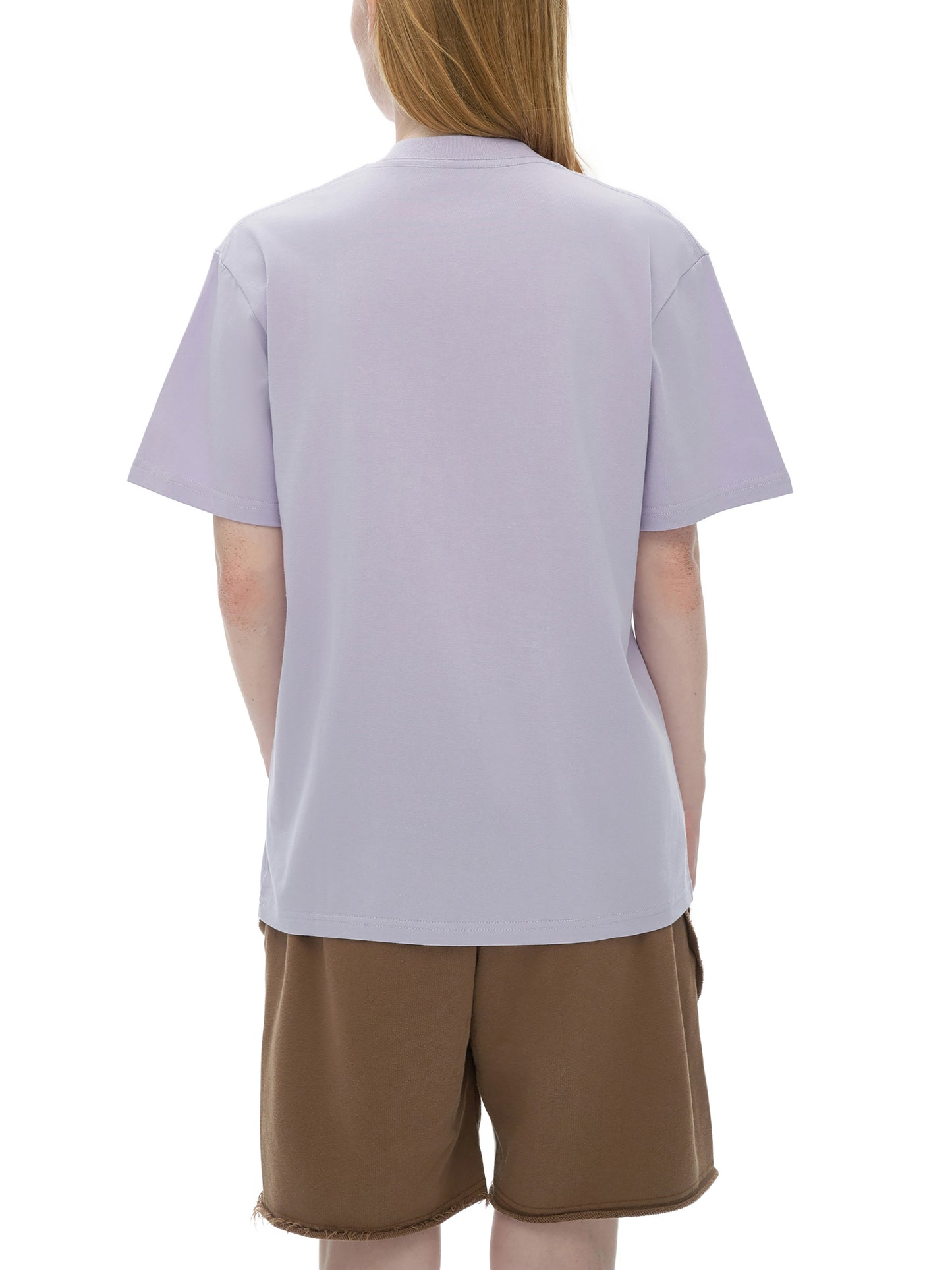 Back view of VÉRON premium streetwear T-shirt on female model