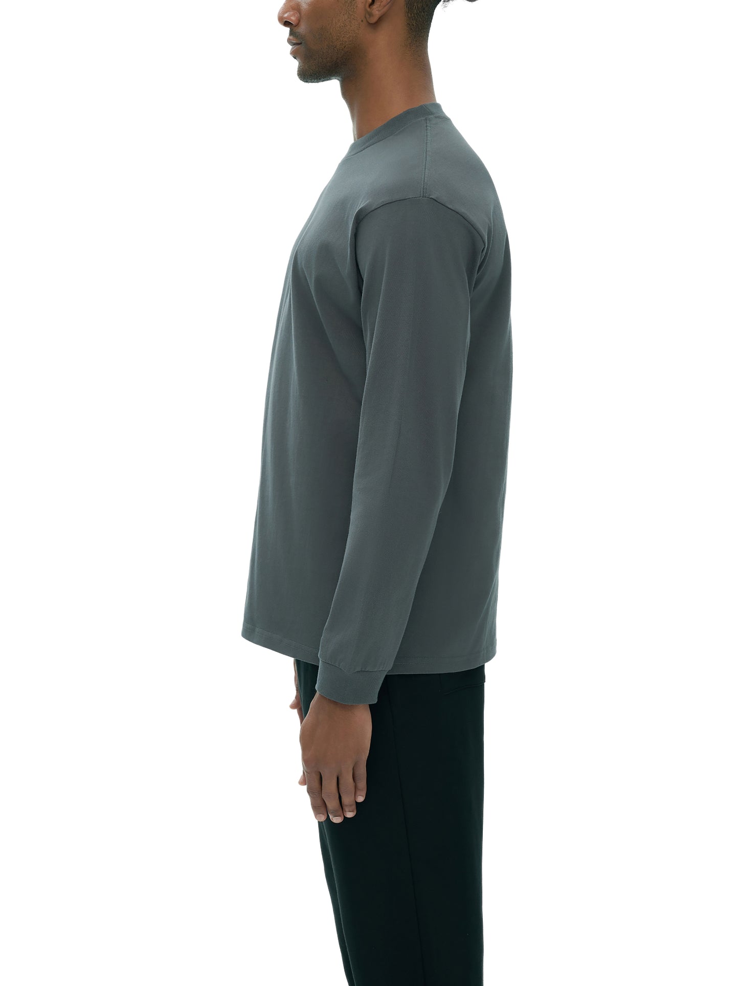 Man wearing VERON gray long-sleeve shirt on a white background
