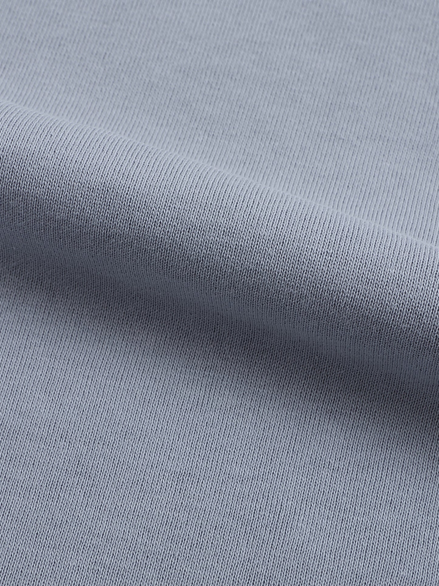 Detail of ribbed cuffs and hem on VÉRON premium sweater.