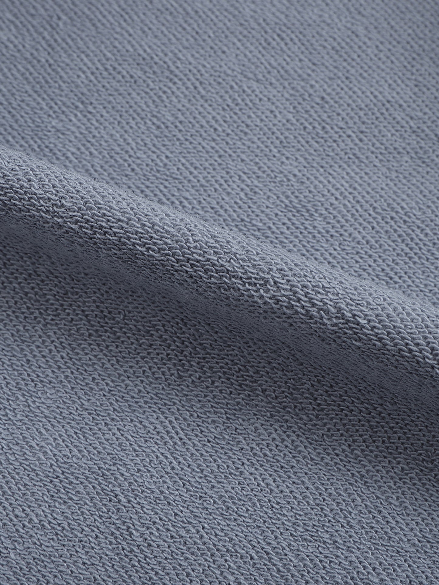Detail of ribbed cuffs and hem on VÉRON premium sweater 6.
