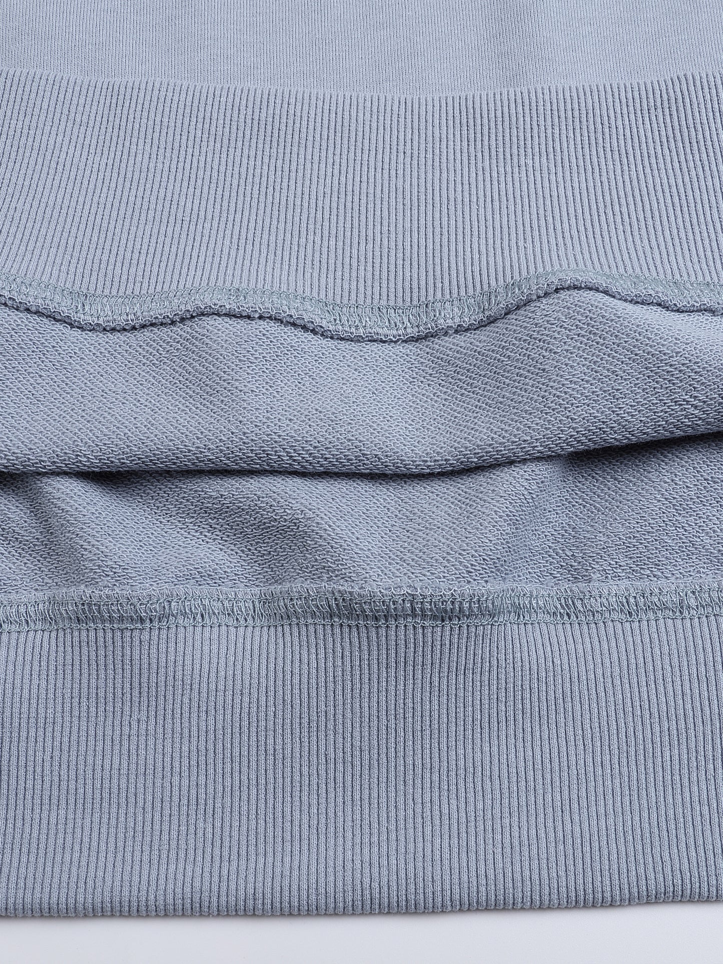 Detail of ribbed cuffs and hem on VÉRON premium sweater 7.