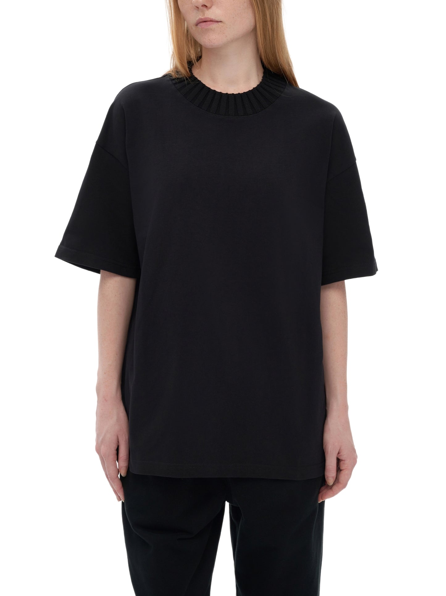Model wearing VÉRON Paris-inspired knitted shirt streetwear style 4