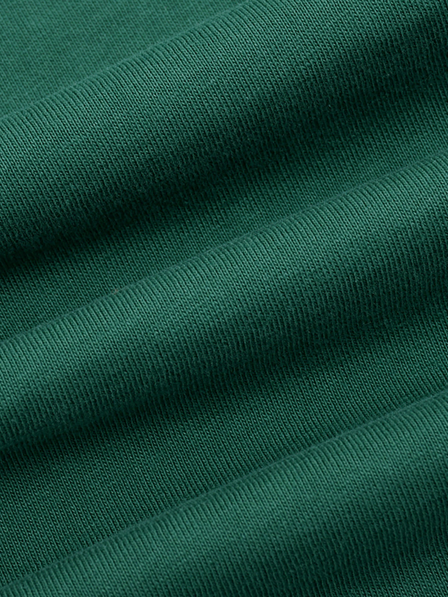 Close-up of cotton fabric on VÉRON Avenue Foch Paris streetwear tee 2