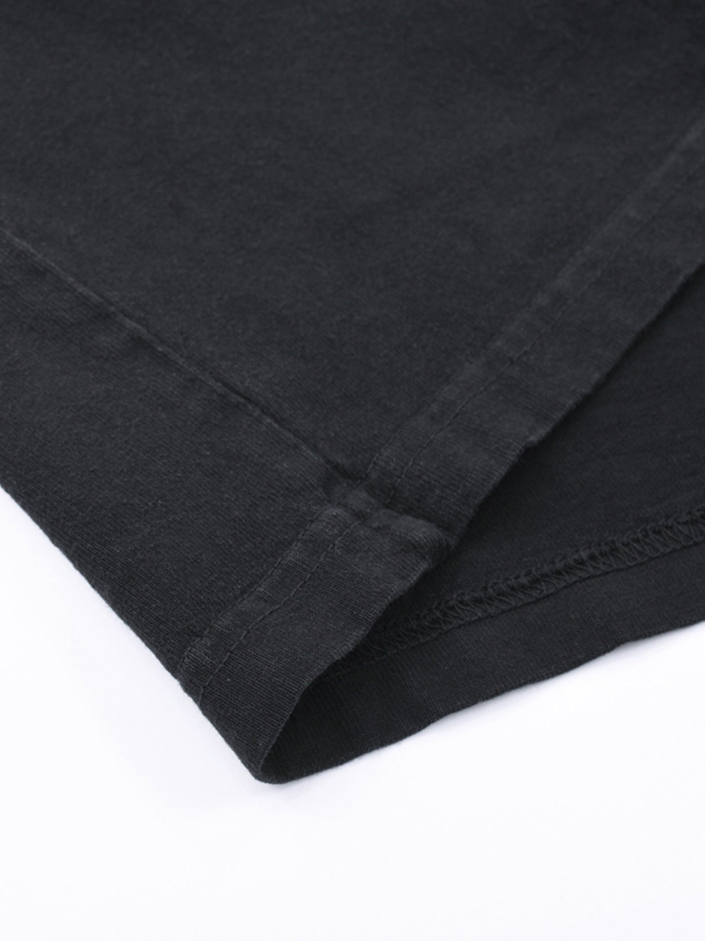 Close-up of fabric quality on VÉRON Cléophée luxury graphic tee 3