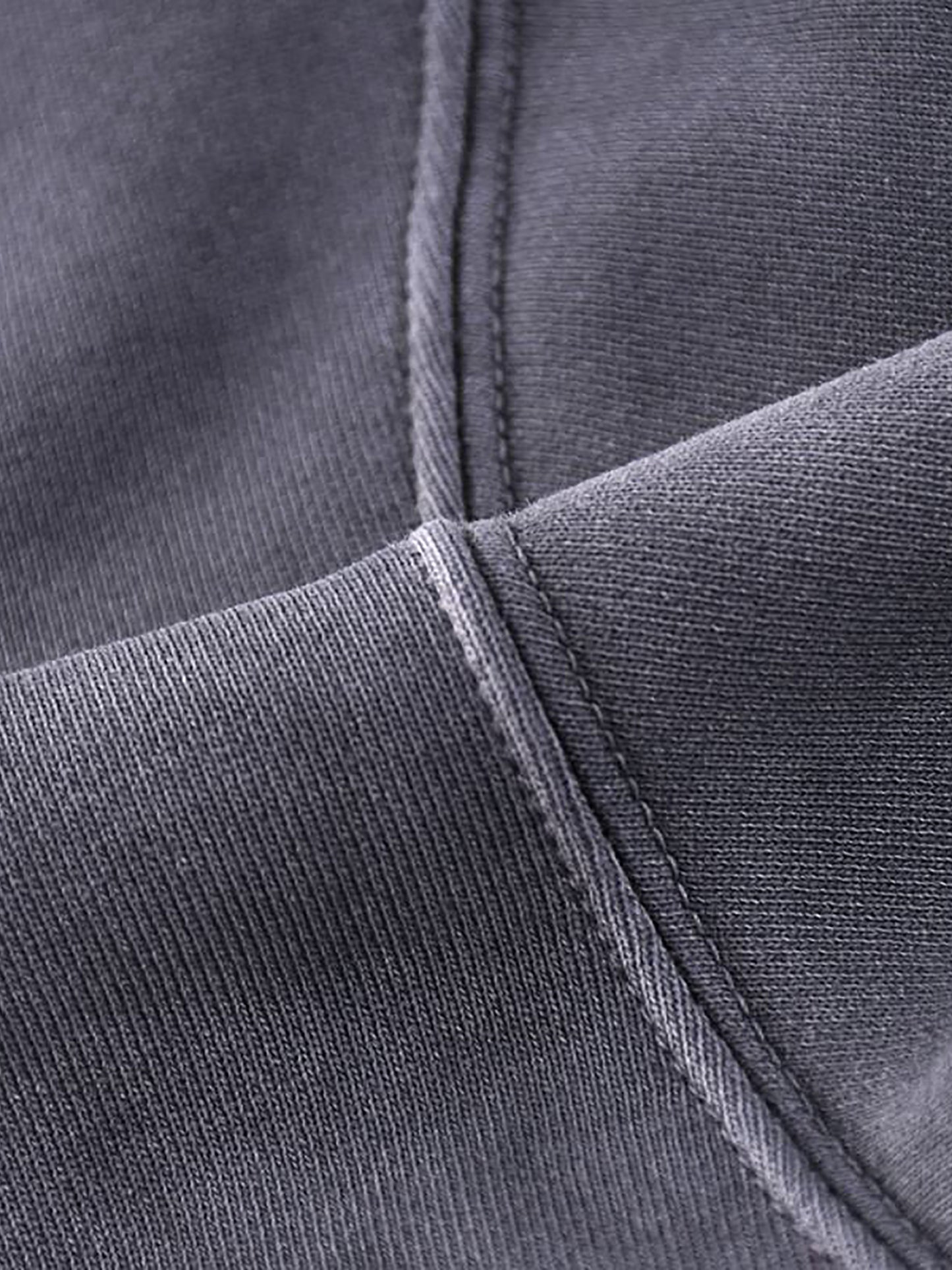 Close-up of a gray fabric with stitching detail