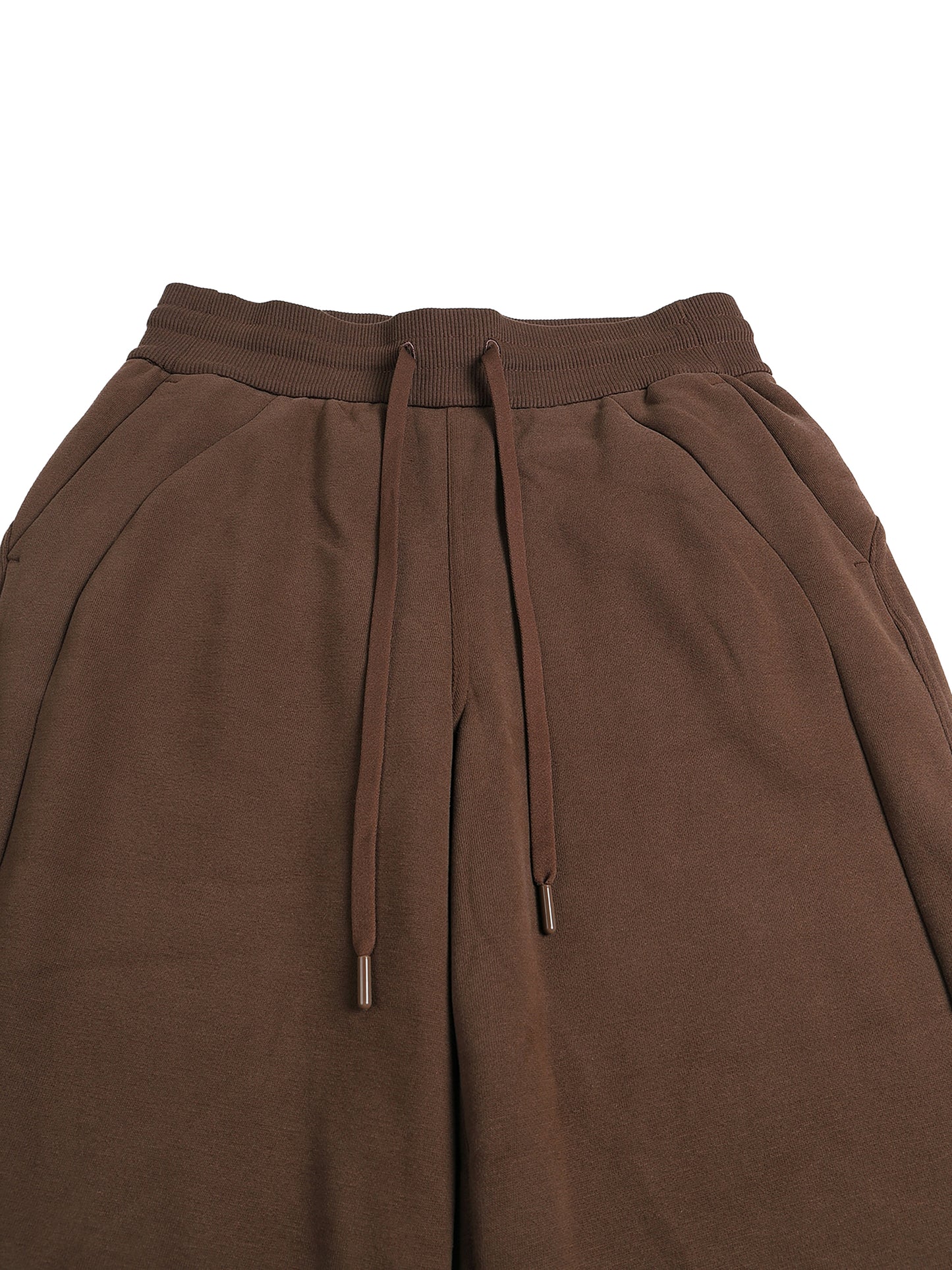Close-up of VÉRON LA Plume waistband and fabric detail.
