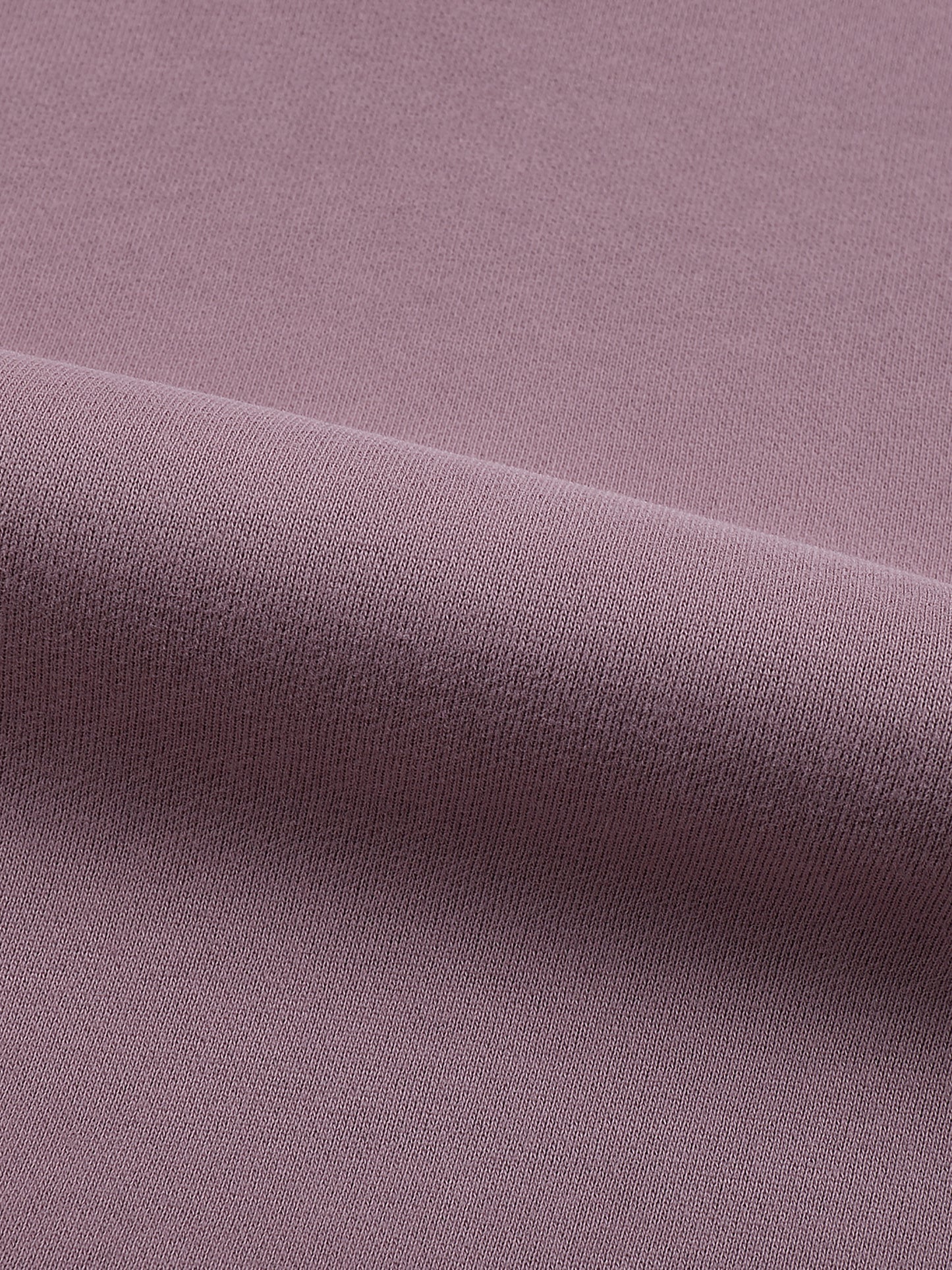 Close-up of purple fabric with a slight texture