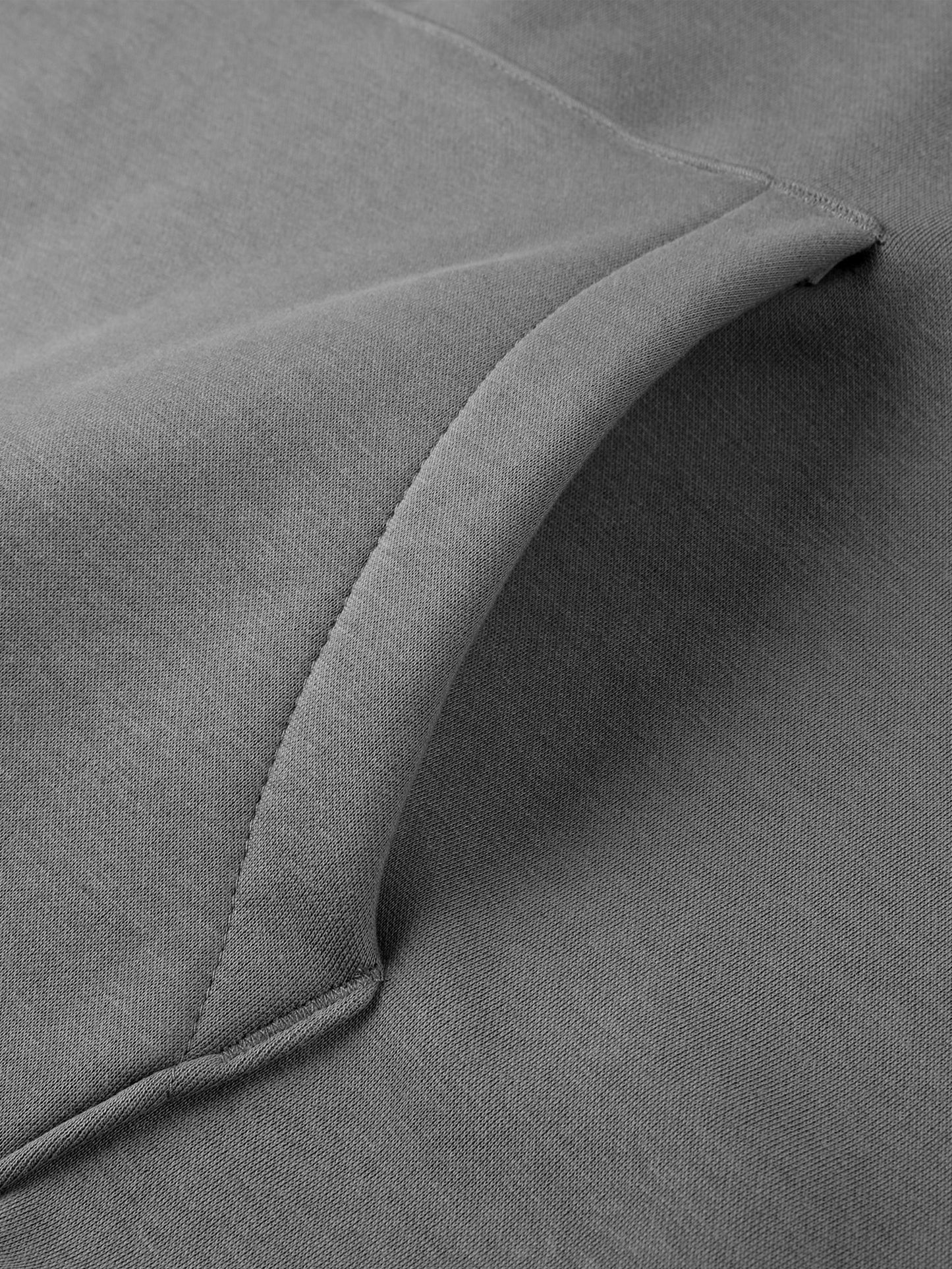 Close-up of gray fabric with a subtle texture.