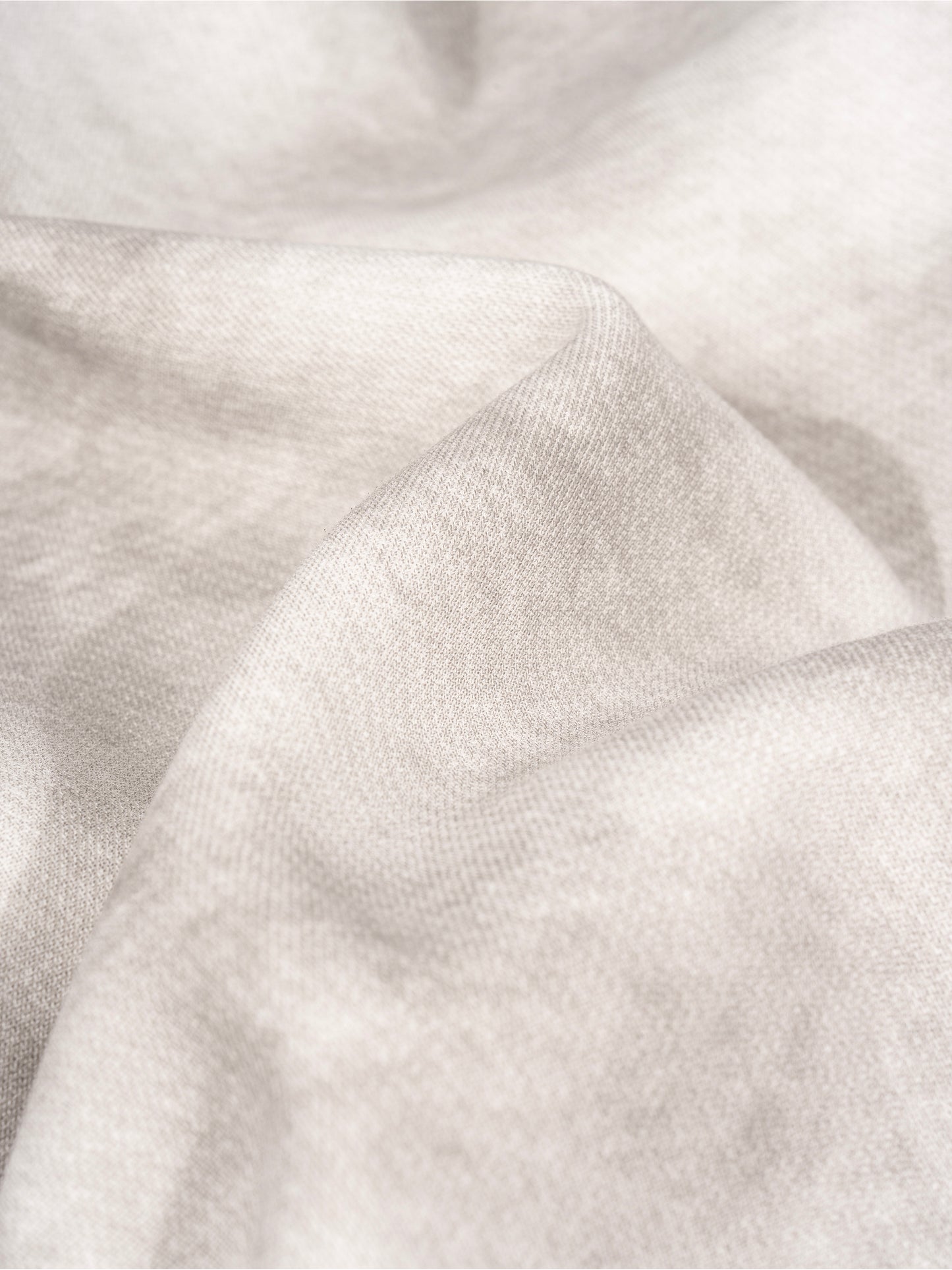 Close-up of white fabric with folds
