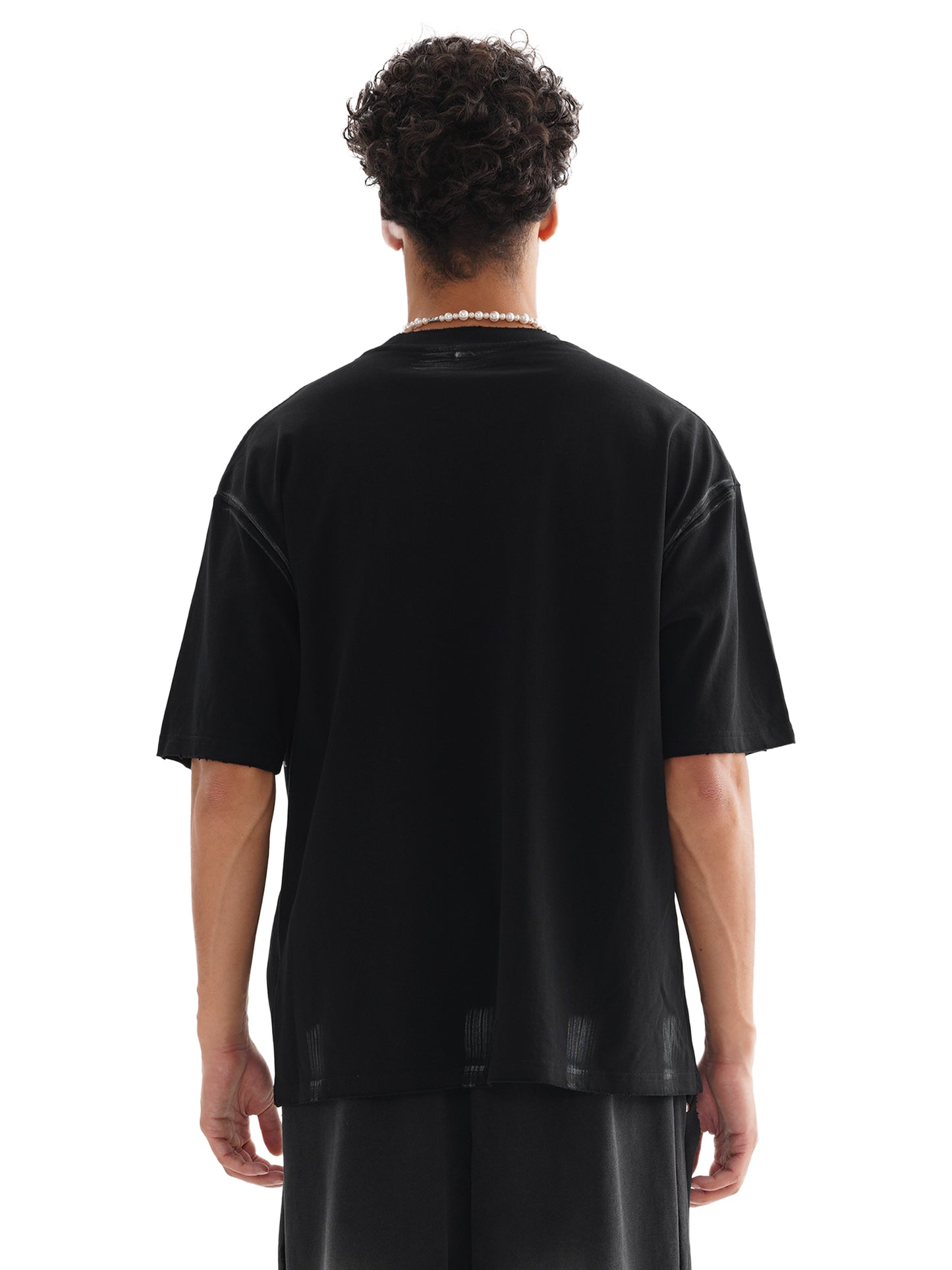 Model wearing VÉRON Le Prince Noir black streetwear tee 3