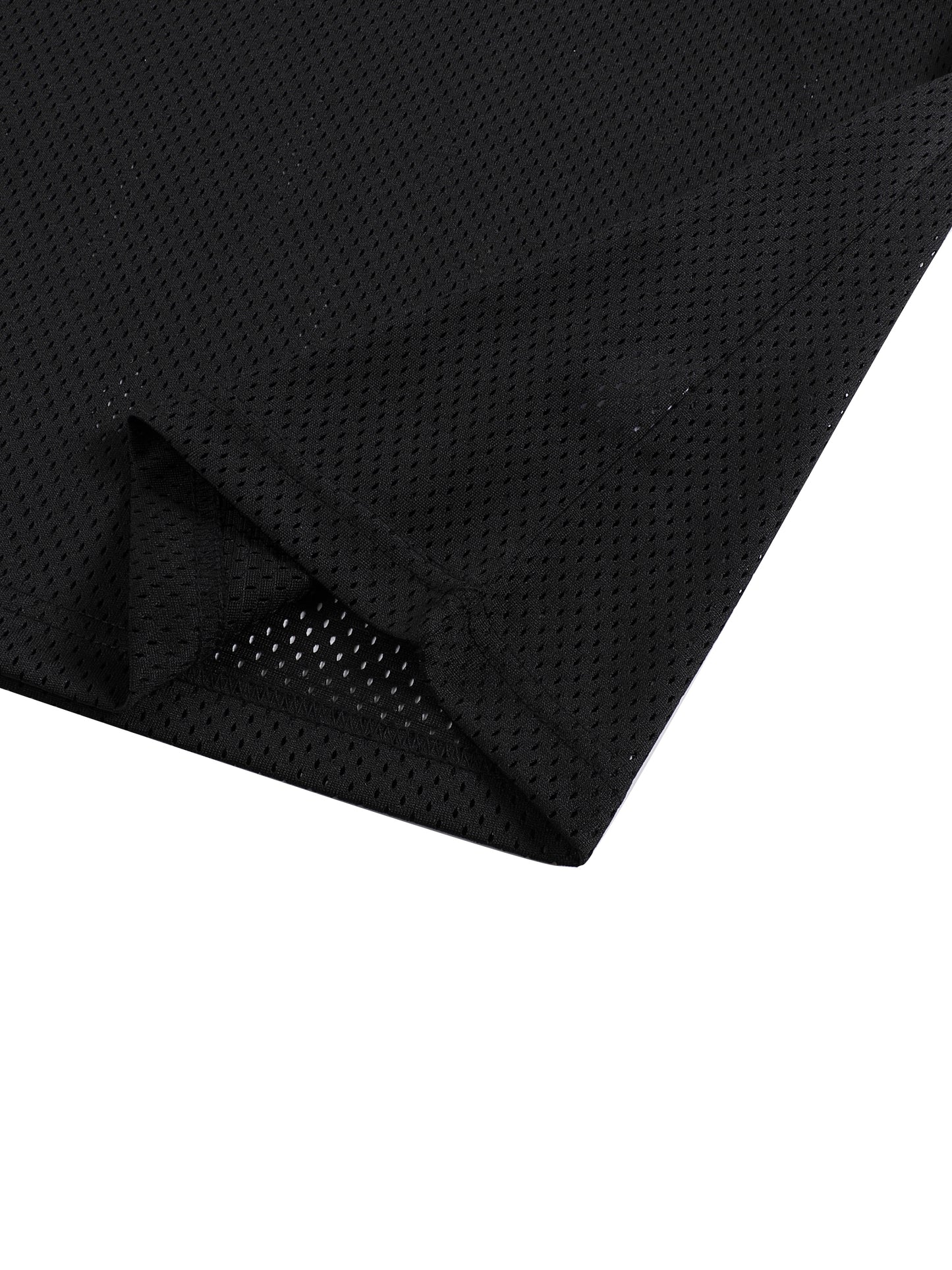 Close-up of black jersey shirt textured fabric on a white background