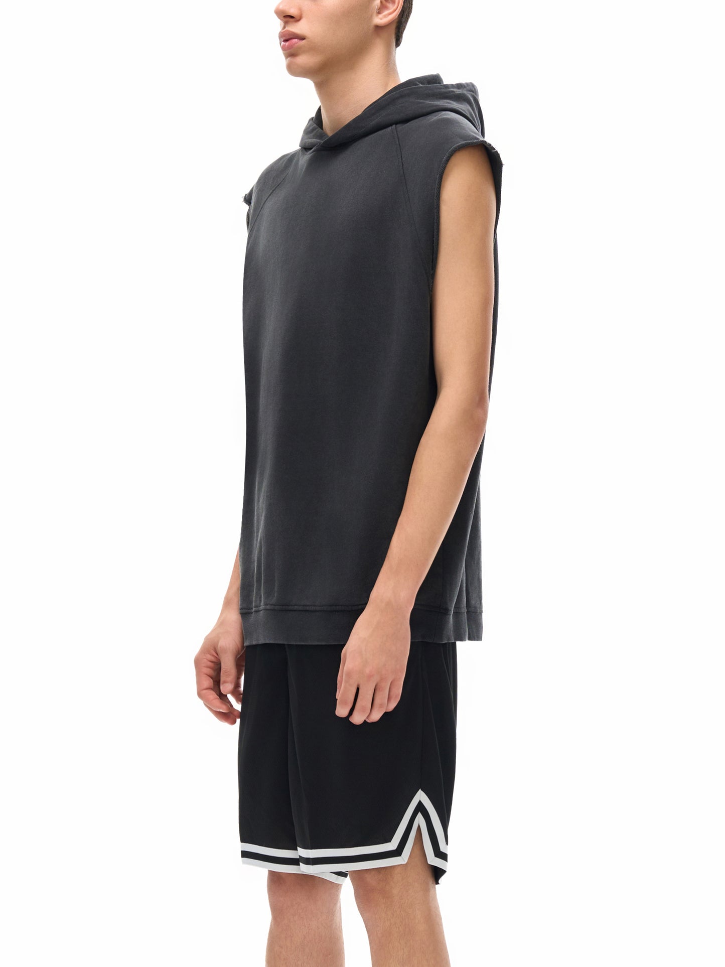 Model wearing VÉRON Rue Amour men’s tank top in urban streetwear style 3