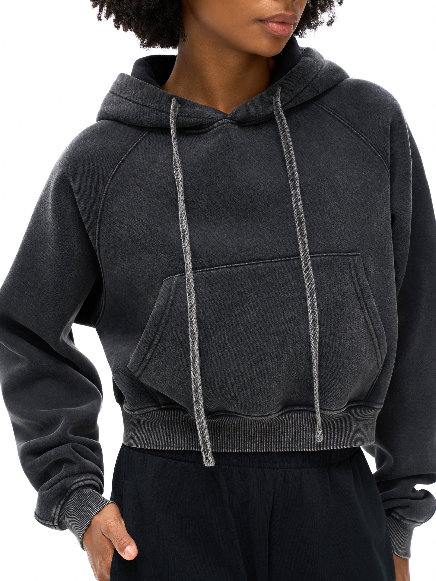 Model wearing VÉRON Auriane women’s streetwear hoodie with relaxed fit 1