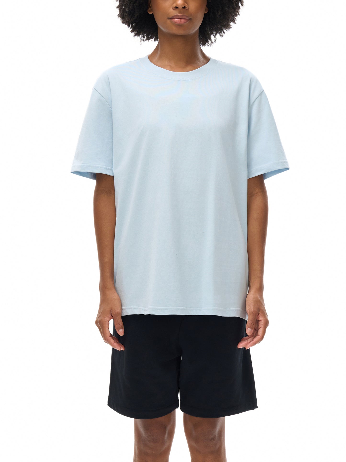 Model wearing VÉRON Paris-inspired streetwear T-shirt 1