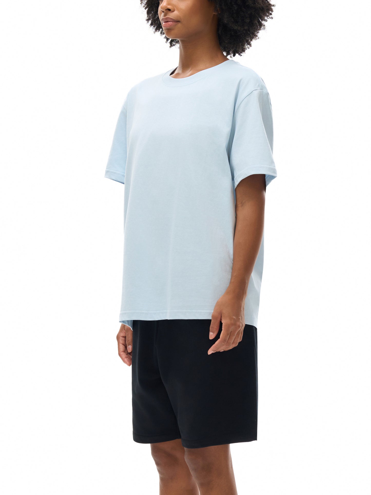 Model wearing VÉRON Paris-inspired streetwear T-shirt 4