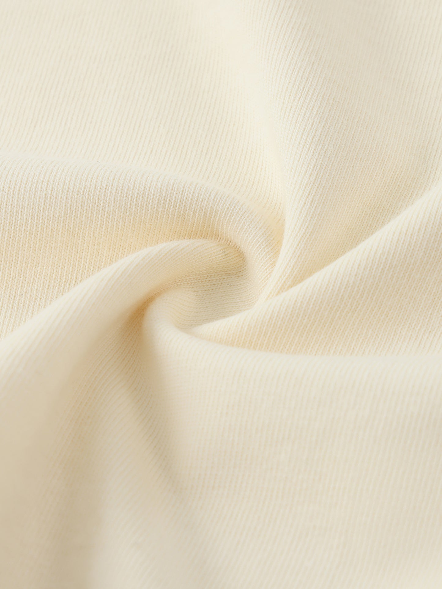 Close-up of beige fabric with a soft texture