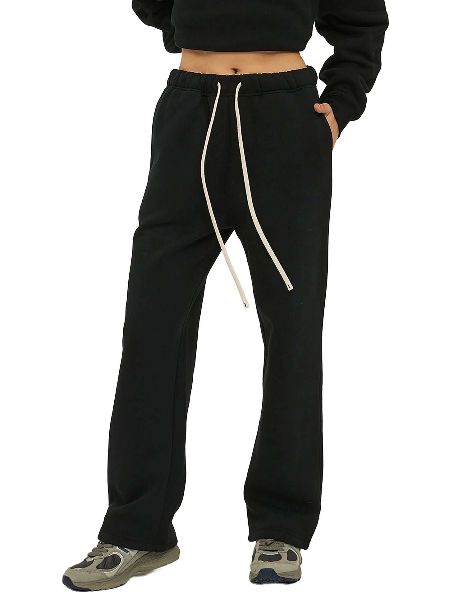 Premium thick fabric close-up on VÉRON Rue Royale Sweatpants on model.