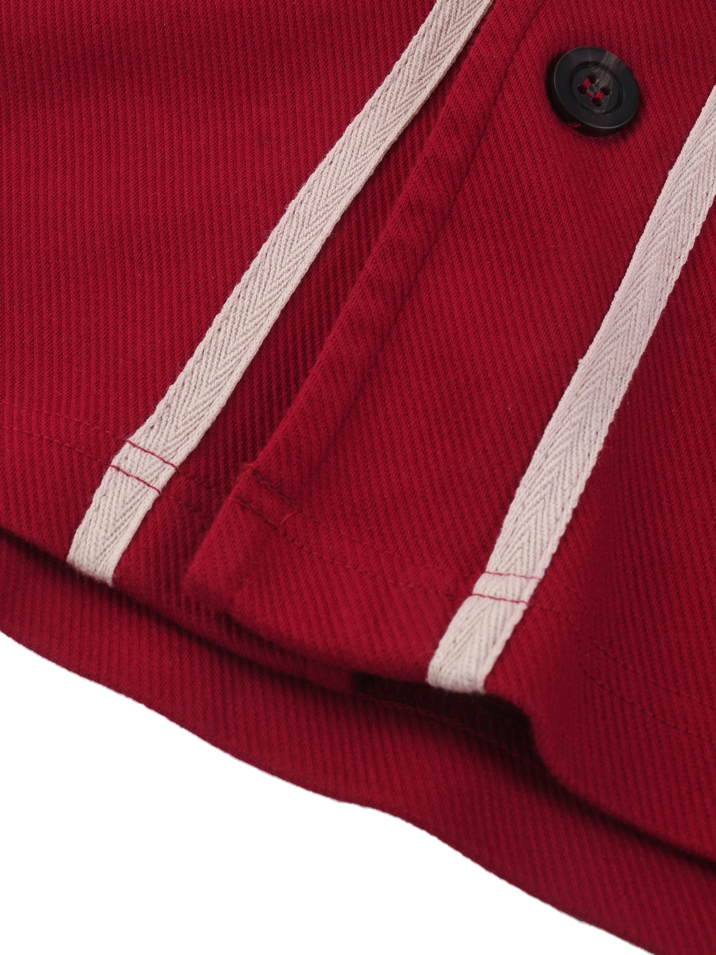 Side angle showing VÉRON button-up unisex shirt fit and fabric texture 2.