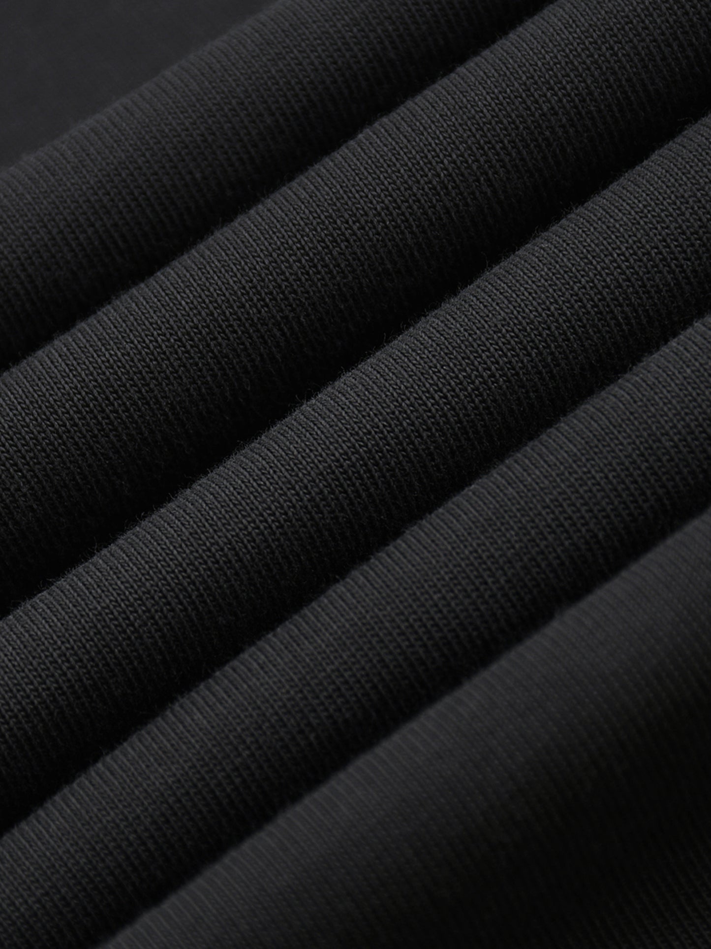 Close-up of black fabric with a textured pattern