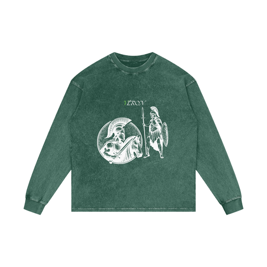 Green long-sleeve shirt with graphic design on a white background