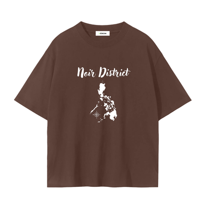 Brown t-shirt with 'Noir District' text and map design on a white background