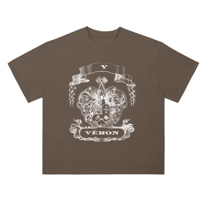 Brown t-shirt with a white graphic design and 'Véron' text on a white background