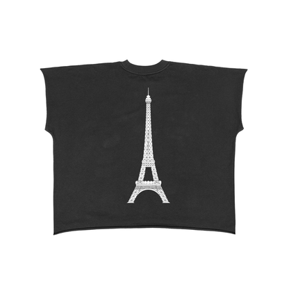 Close-up of bold “ICI C’EST PARIS” graphic on VÉRON tank top. 

