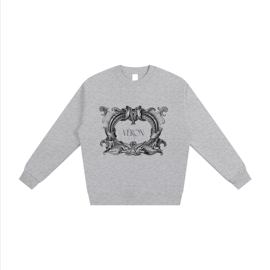 Gray sweatshirt with decorative black emblem and 'VERON' text on a white background