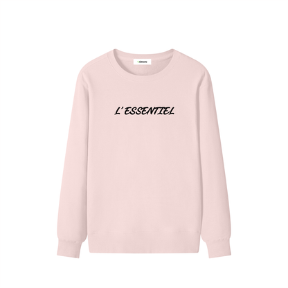 Pink sweatshirt with 'L'ESSENTIEL' text on a white background