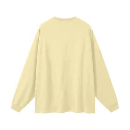 Light yellow long-sleeve shirt on a white background