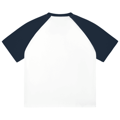 Baseball-style shirt with navy sleeves on a white background