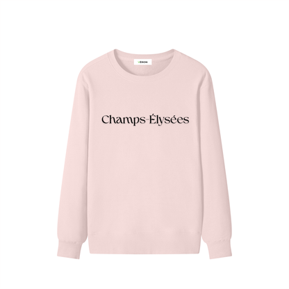 Pink sweatshirt with 'Champs Élysées' text on a white background