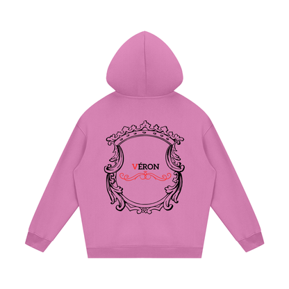 Pink hoodie with decorative back design and 'VERON' text on a white background