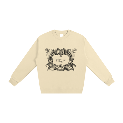 Beige sweatshirt with decorative emblem and 'VERON' text on a white background