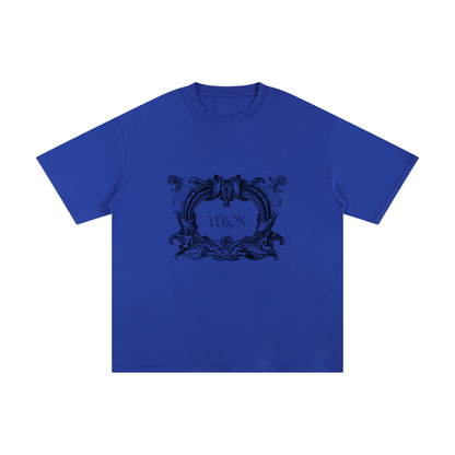 Blue t-shirt with decorative black logo and 'VIKON' text on a white background