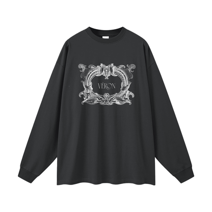 Black long-sleeve shirt with decorative emblem and 'VERON' text on a white background