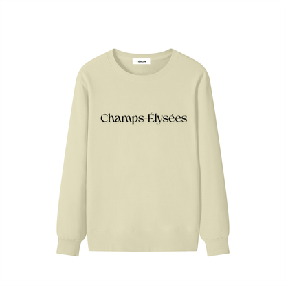 Beige sweatshirt with 'Champs Élysées' text on a white background