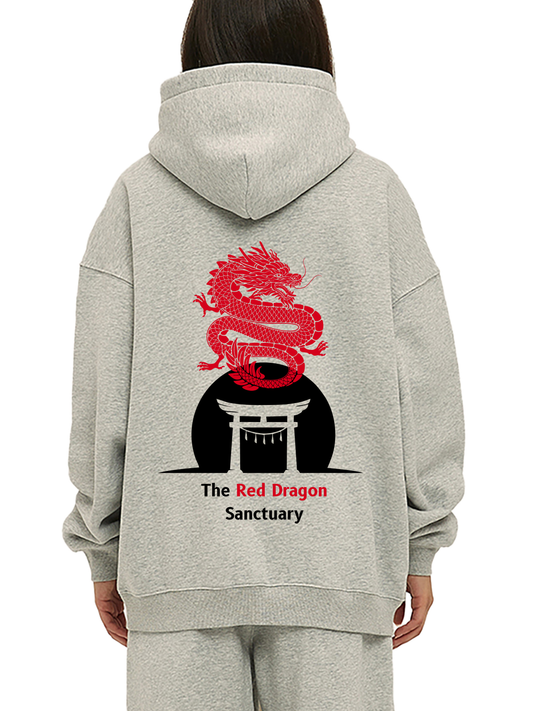 Person wearing a gray hoodie with a red dragon design on the back, labeled 'The Red Dragon Sanctuary'.