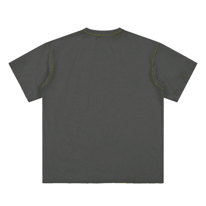 Gray t-shirt with green stitching on a white background