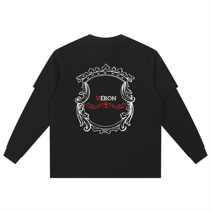 Black long-sleeve shirt with decorative emblem and 'VERON' text on a white background