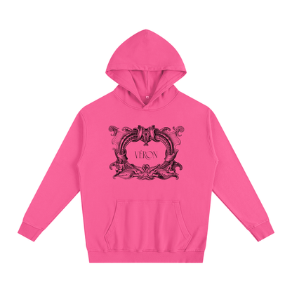 Pink hoodie with decorative design and 'VERON' text on a white background