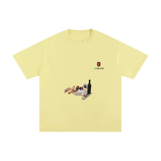 VÉRON La Culture Unisex T-Shirt front view in yellow.