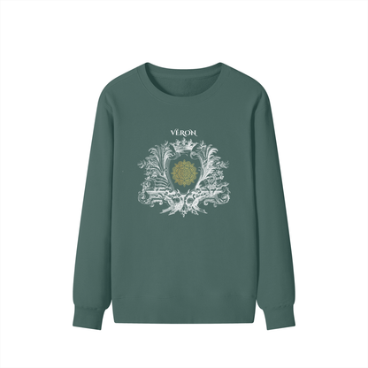 Green sweatshirt with decorative design and 'Véron' text on a white background