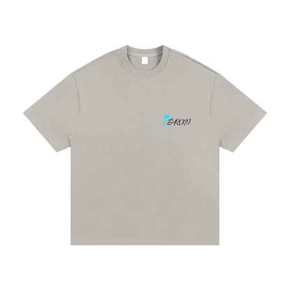VÉRON Berkeley t-shirt styled with jeans for casual luxury streetwear look.