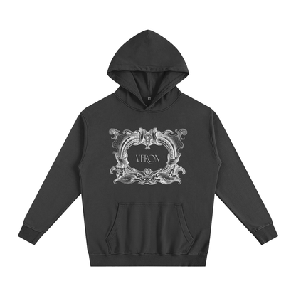 Black hoodie with decorative emblem and 'VERON' text on a white background