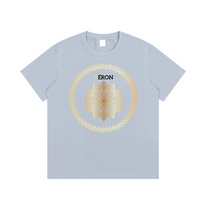 Light blue t-shirt with a gold mandala design and 'Veron' branding on a white background