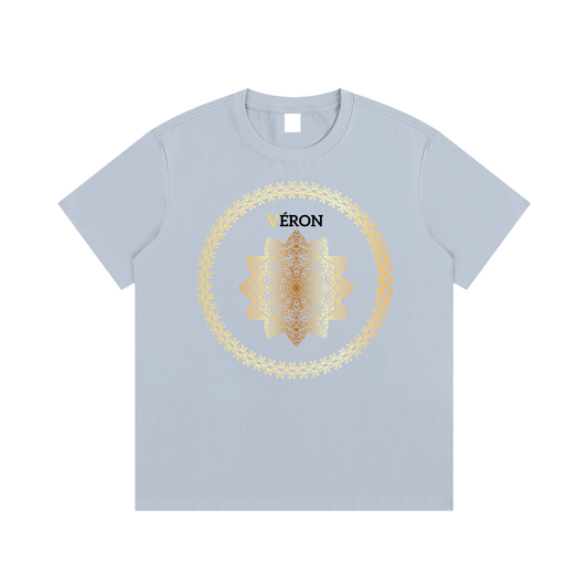 Light blue t-shirt with a gold mandala design and 'Veron' branding on a white background